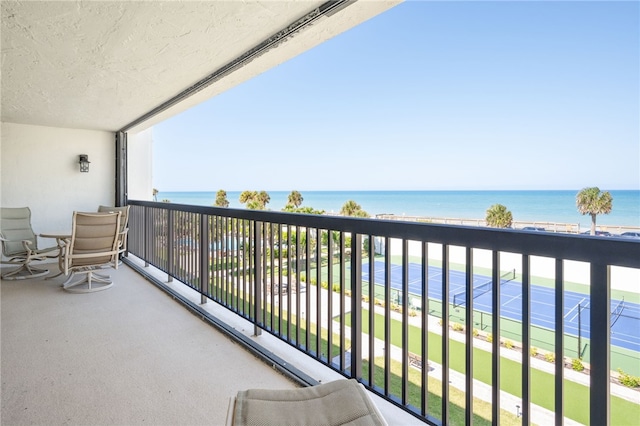 balcony featuring a water view