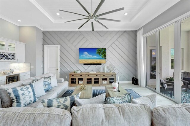 9378 Orchid Cove Cir, Vero Beach, FL 32963 - living room featuring crown molding, ceiling fan, a bar, recessed lighting, and wine cooler