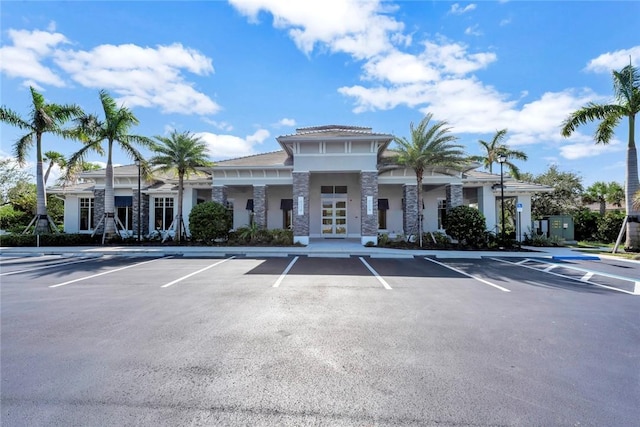 9378 Orchid Cove Cir, Vero Beach, FL 32963 - view of building exterior featuring uncovered parking