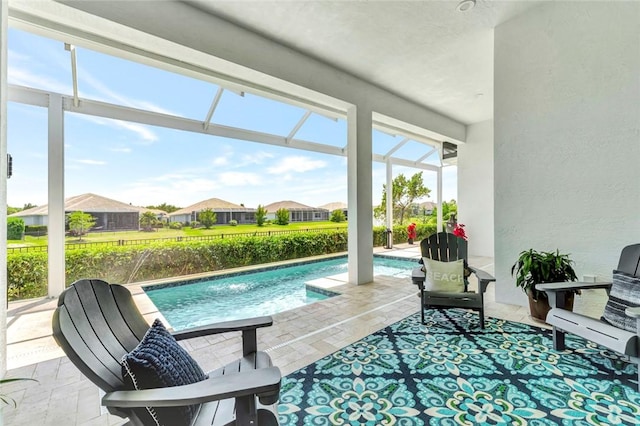 9378 Orchid Cove Cir, Vero Beach, FL 32963 - pool featuring a residential view, glass enclosure, and a patio area