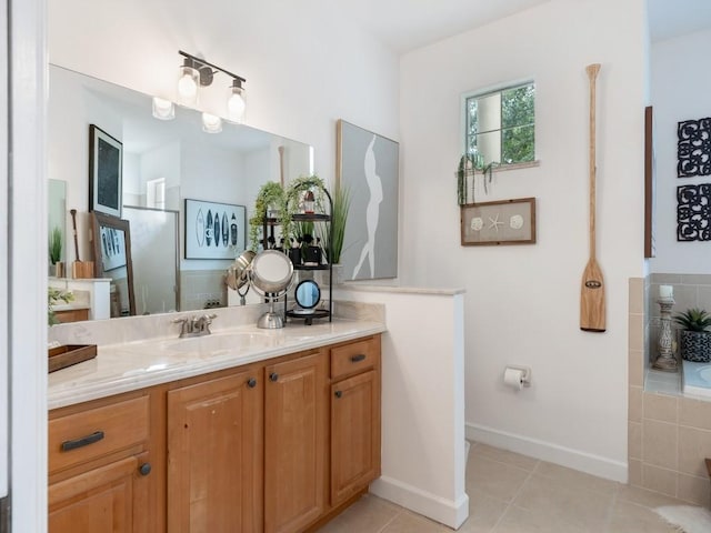 bathroom with vanity and tile patterned flooring