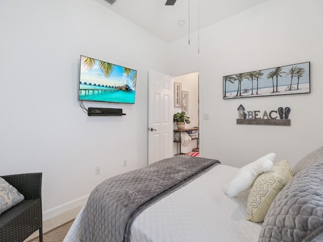 bedroom featuring tile patterned flooring and ceiling fan