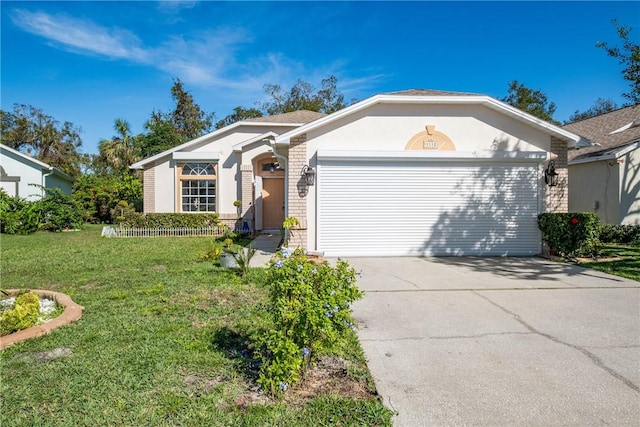 single story home featuring a front lawn and a garage