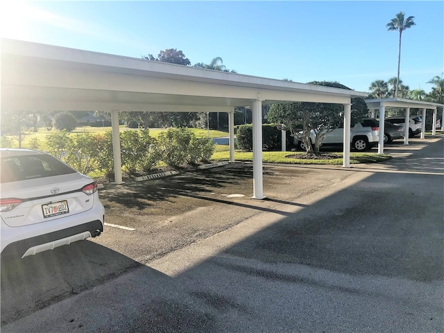 view of car parking with a carport