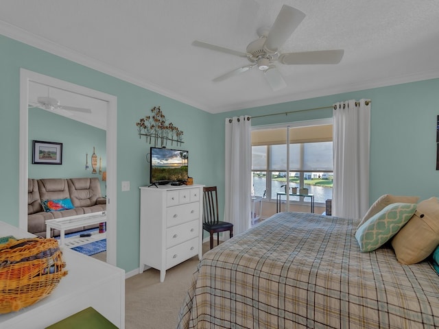 bedroom featuring a textured ceiling, light carpet, ceiling fan, and crown molding