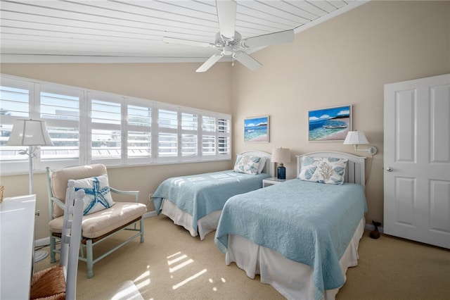 bedroom featuring wood ceiling, ceiling fan, and carpet