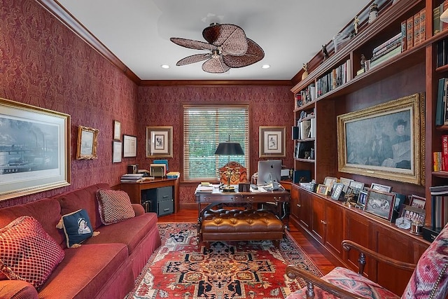 office area featuring hardwood / wood-style floors, ceiling fan, and crown molding