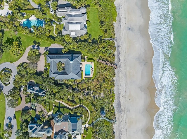 aerial view of property's location featuring a pool area