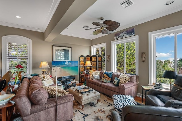 living room featuring ceiling fan, hardwood / wood-style floors, and ornamental molding