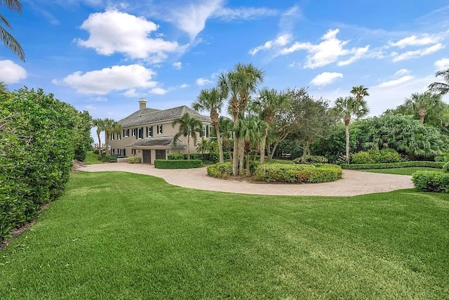 exterior space featuring a lawn