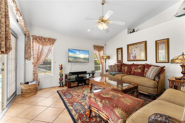147 Empire Ter, Sebastian, FL 32958 - living room featuring light tile patterned floors, a wealth of natural light, ceiling fan, and vaulted ceiling