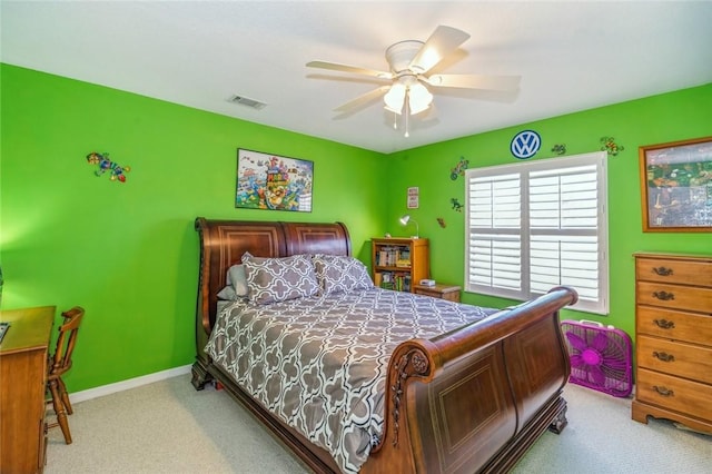 bedroom with ceiling fan and carpet