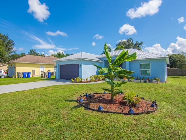 ranch-style home with a front yard and a garage