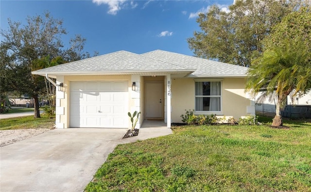 single story home with an attached garage, stucco siding, a shingled roof, concrete driveway, and a front lawn