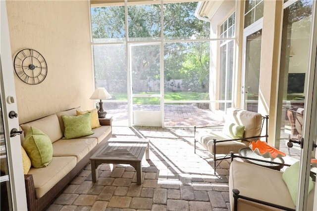 sunroom featuring a healthy amount of sunlight