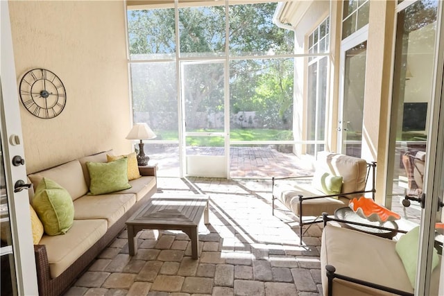 1632 Weybridge Cir, Vero Beach, FL 32963 - sunroom / solarium featuring healthy amount of natural light and french doors