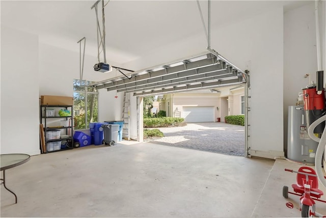 1632 Weybridge Cir, Vero Beach, FL 32963 - garage with electric water heater and a garage door opener
