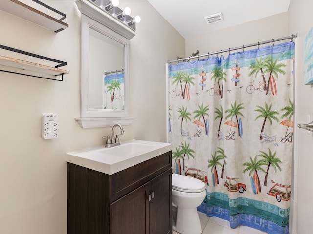 bathroom with toilet, vanity, a shower with shower curtain, and tile patterned flooring