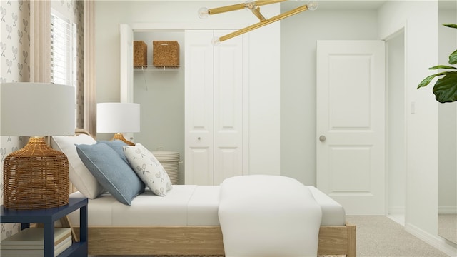 carpeted bedroom with a closet