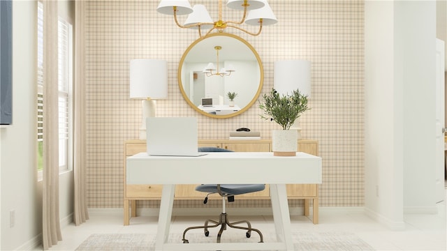 bathroom featuring an inviting chandelier, tile patterned flooring, and plenty of natural light