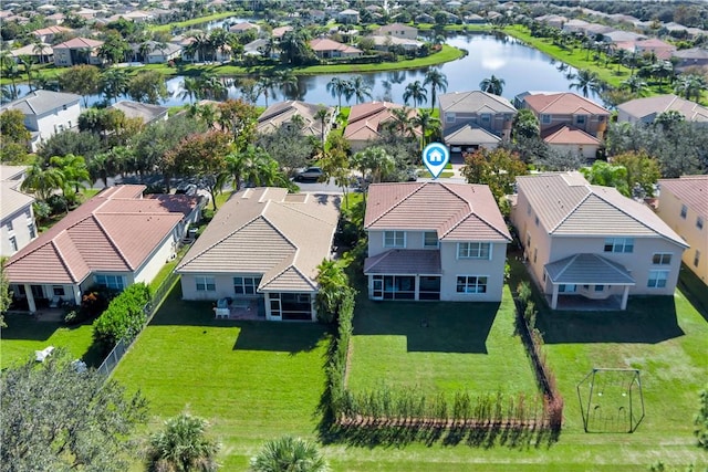 drone / aerial view with a water view