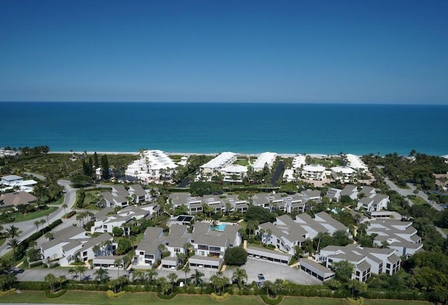 birds eye view of property featuring a residential view and a water view