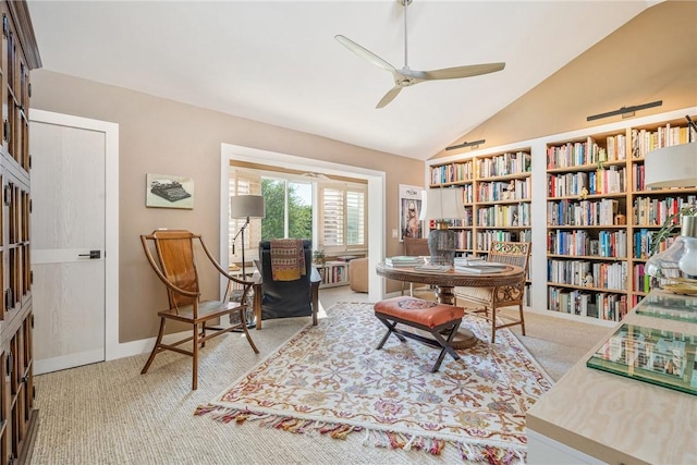 sitting room featuring light carpet, ceiling fan, and vaulted ceiling