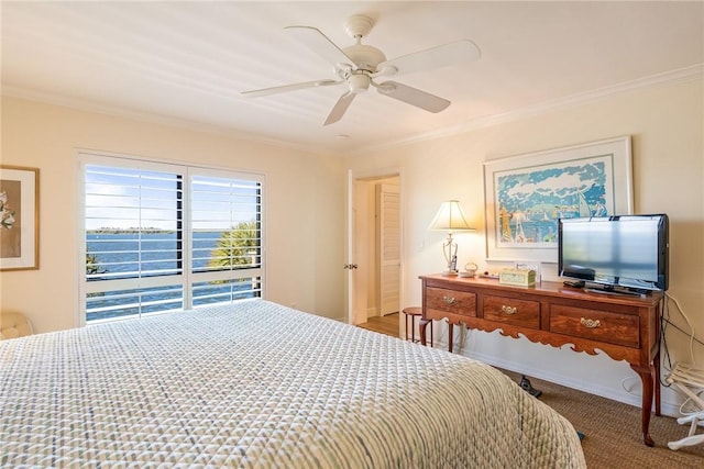 bedroom featuring a ceiling fan and ornamental molding