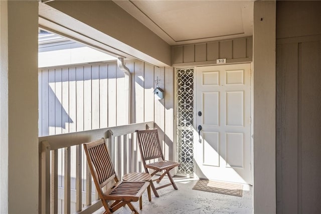 property entrance with board and batten siding