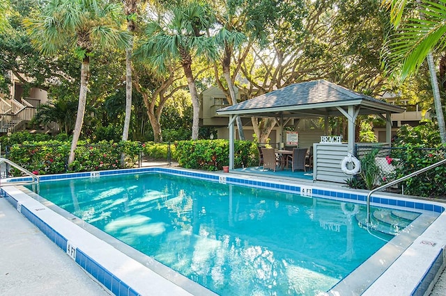 110 Amy Ann Ln, Vero Beach, FL 32963 - community pool with a gazebo and outdoor dining space