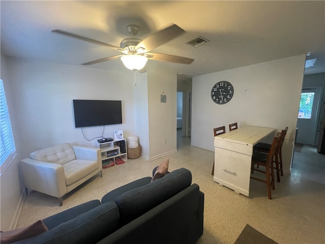 living room with ceiling fan