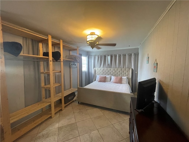 tiled bedroom featuring ornamental molding