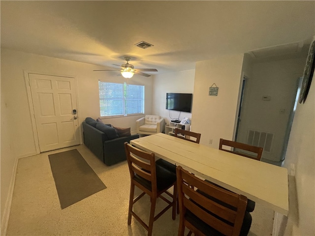 dining room with ceiling fan