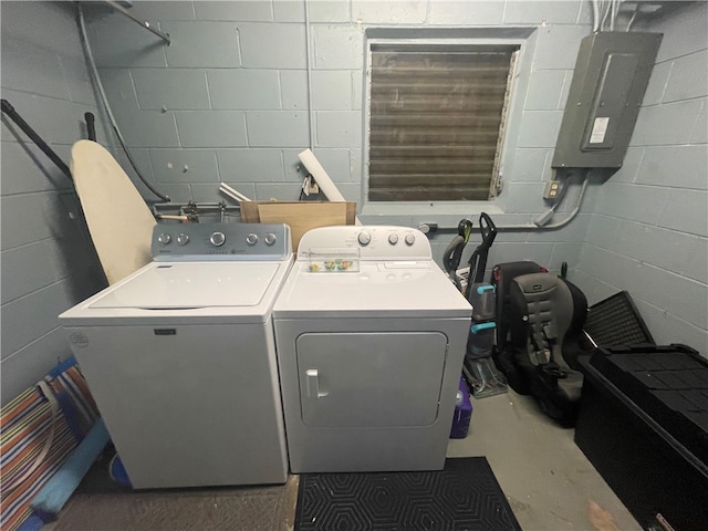 laundry area featuring washer and dryer and electric panel