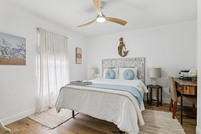 9830 Oak Trl, Sebastian, FL 32976 - bedroom with wood finished floors and ceiling fan