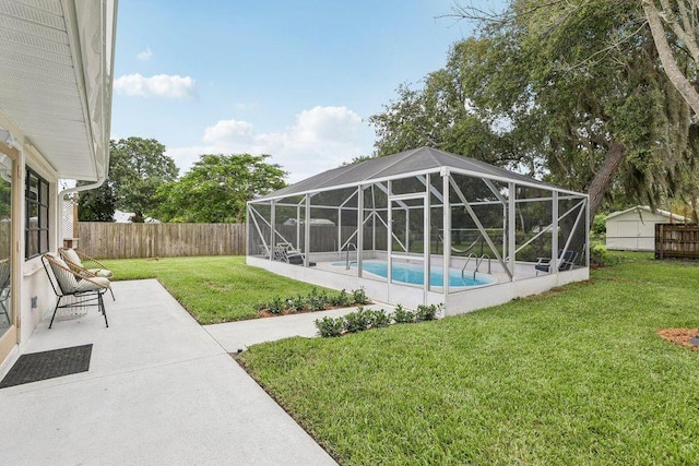 9830 Oak Trl, Sebastian, FL 32976 - view of swimming pool featuring a fenced backyard, a patio area, and glass enclosure