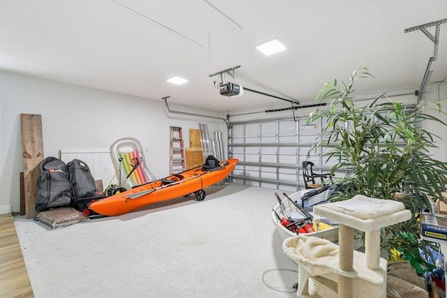 9830 Oak Trl, Sebastian, FL 32976 - garage featuring a garage door opener