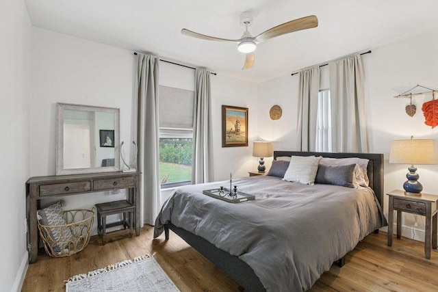 9830 Oak Trl, Sebastian, FL 32976 - bedroom featuring wood finished floors and a ceiling fan