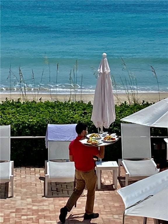 water view featuring a beach view