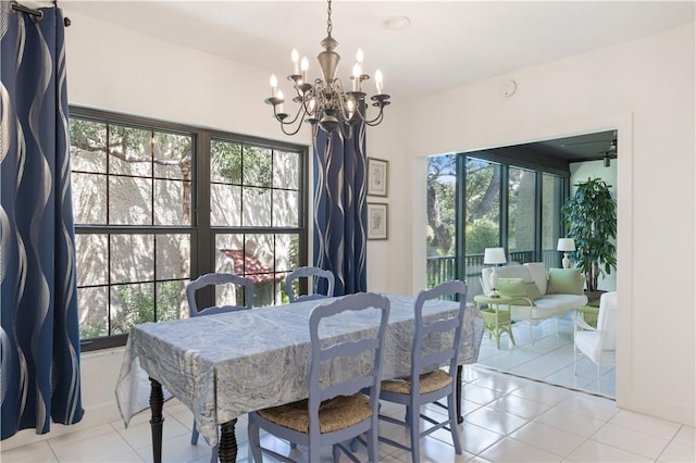 5151 A1A Hwy Unit 506, Indian River Shores, FL 32963 - dining area featuring a chandelier, plenty of natural light, and light tile patterned floors