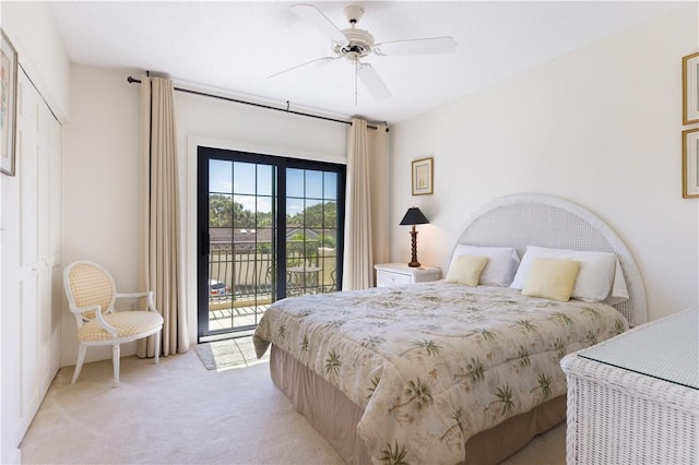 5151 A1A Hwy Unit 506, Indian River Shores, FL 32963 - bedroom featuring access to outside, light carpet, and a ceiling fan