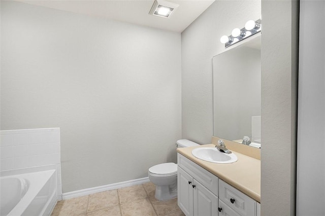 bathroom with vanity, tile patterned flooring, toilet, and a bathing tub