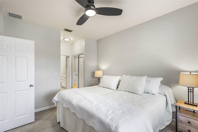 bedroom with ceiling fan, carpet floors, and a closet