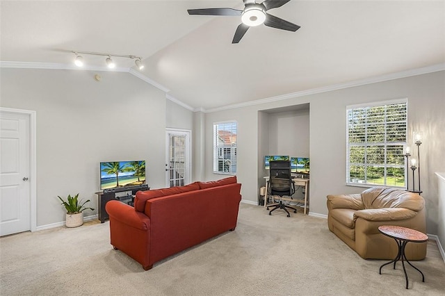 carpeted living room with crown molding, lofted ceiling, track lighting, and ceiling fan