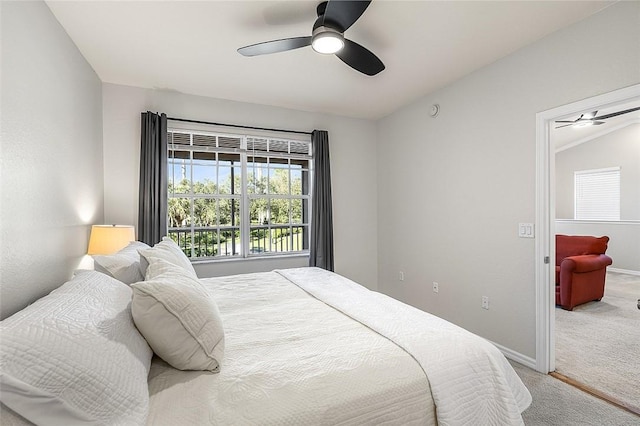 bedroom with ceiling fan and carpet flooring