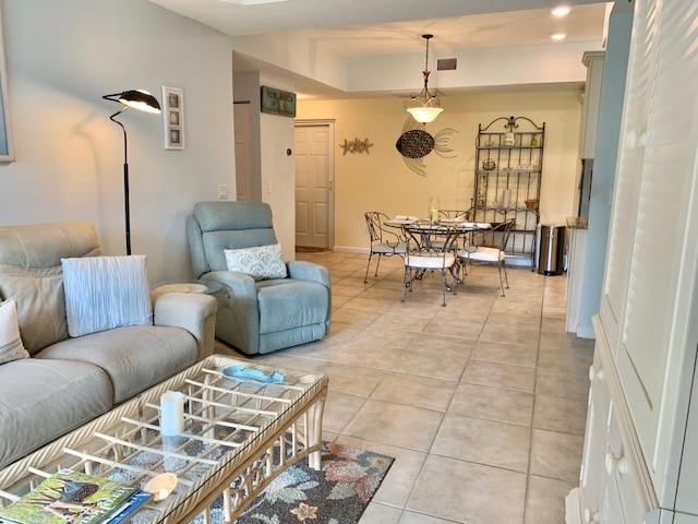 living room with light tile patterned floors