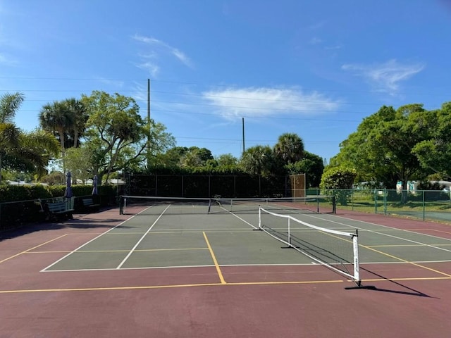 view of sport court with community basketball court and fence