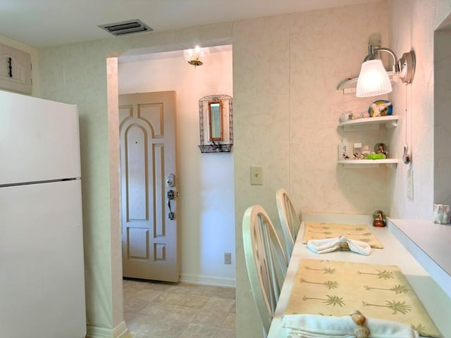 dining space with visible vents