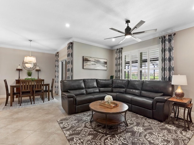 tiled living room with crown molding and ceiling fan