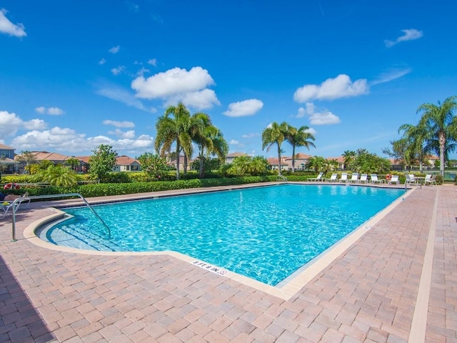 view of swimming pool featuring a patio